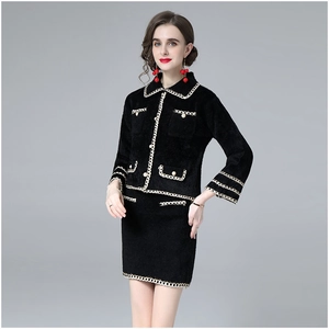 Elegant black faux mink two-piece set featuring a jacket and skirt with chain trim