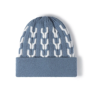 Winter fleece-lined knit beanie featuring blue and white jacquard pattern with folded cuff
