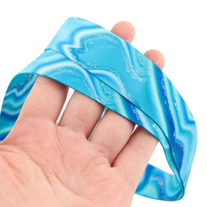 Close-up of blue marble pattern neck lanyard held in hand for card holders