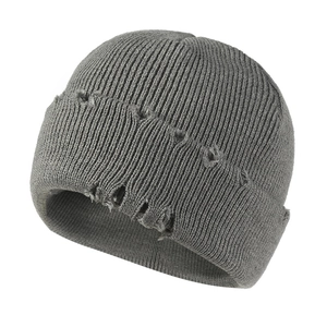 Distressed grey ribbed knit beanie for men and women with stylish ripped hole details