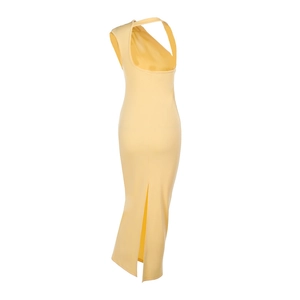 Detail view of the yellow backless maxi dress with side slit and slim fit silhouette