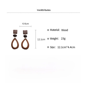 Detailed chart showing wood geometric earring dimensions 12.1cm by 4.4cm and 23g weight