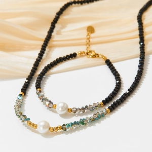 Minimalist stainless steel bracelet and necklace set with black faceted crystals and pearl