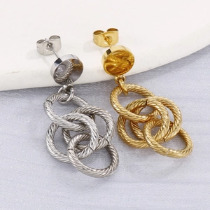 Boucles d'oreilles créoles multicouches en métal torsadé rétro en finition or et argent