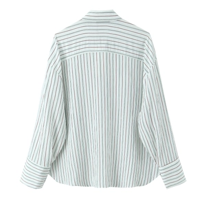 Detail of striped poplin shirt back with horizontal stripe yoke and vertical line patterns