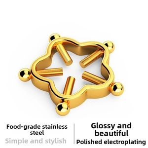 Detailed view of non-piercing gold star nipple jewelry with adjustable screws