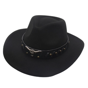 Detail of western felt hat with leather band featuring silver bull head and brass studs