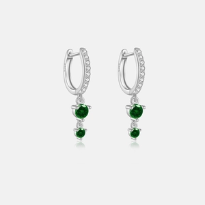 Detailed close-up of S925 sterling silver earrings featuring green gemstones and small zircons