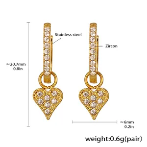 Detail view of gold stainless steel heart earrings with zircon inlay and dimensions