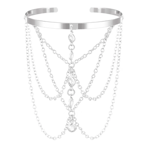 Detail of silver arm cuff featuring multi-layer chain tassels and sparkling clear crystals