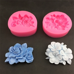 Pink silicone gardenia and flower molds with blue and white resin finished samples