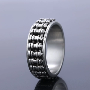 Polished silver stainless steel chain link ring with industrial textured design