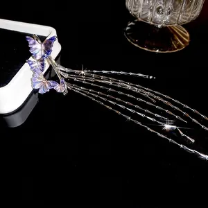 Elegant purple butterfly earrings with long silver tassels and gradient metallic finish