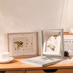 Modern light grey wooden double-sided rotating photo frame with minimalist Nordic decor