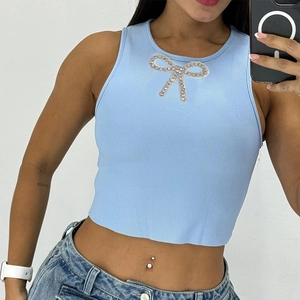 Slim fit light blue knit crop top with a large rhinestone butterfly detail on the chest