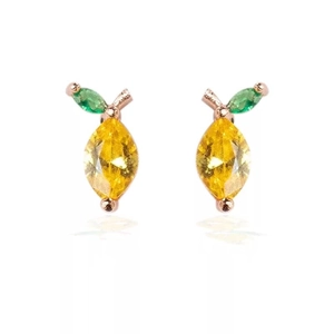 Detail of cute lemon stud earrings with yellow marquise stones and green leaf accents