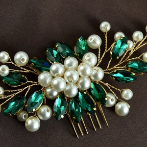 Detailed view of handmade bridal hair comb with pearls and green navette rhinestones