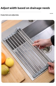 Adjustable roll-up stainless steel dish drying rack shown over a kitchen sink