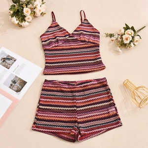 Detailed view of wave-textured knit two-piece set with crop top and drawstring shorts