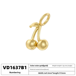 Macro detail of 18K gold plated cherry pendant with size and material specifications