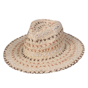 Bohemian straw sun hat with colorful cross-stitch embroidery and wide brim for beach vacation