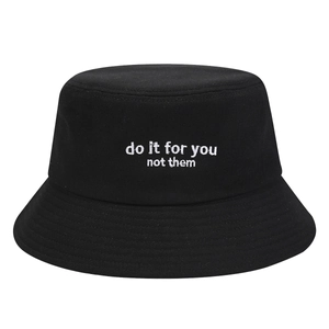 Black bucket hat featuring white embroidered do it for you not them motivational quote