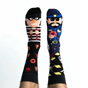 Detail of creative mismatched socks featuring cartoon robber and police officer patterns