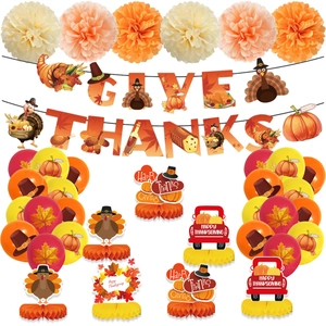 Complete Thanksgiving party set with Give Thanks banner, balloons, and honeycomb centerpieces
