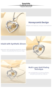 Detail of s925 silver heart necklace with bee, sunflower and I love you forever engraving