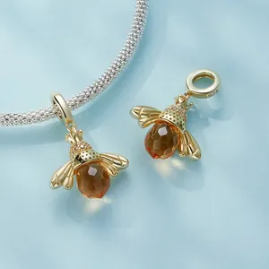 Elegant S925 sterling silver honey bee charm with gold plating and amber crystals