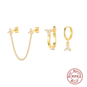 Three-piece 925 sterling silver earring set in gold with triple zircon accents
