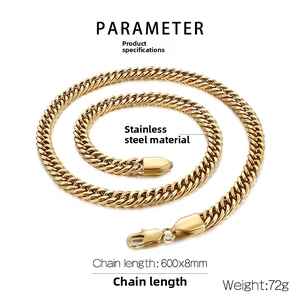 Macro view of gold stainless steel Cuban chain necklace with lobster clasp and sizing details