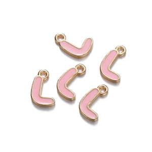Detail view of five gold-plated letter L charms with pink enamel for DIY jewelry