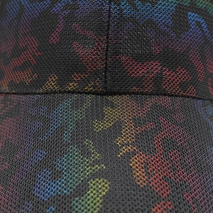 Detail of breathable black mesh baseball cap featuring rainbow gradient horse silhouettes