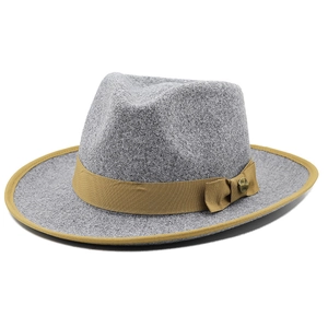 Detail of grey wool felt fedora featuring brown grosgrain ribbon and vintage metal buckle