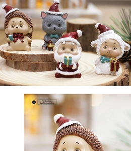Macro detail of cute resin hedgehog ornament with a red Christmas hat on a wood stump