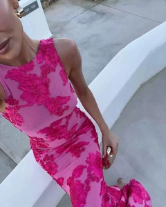 Detail of pink sleeveless long dress featuring intricate 3D floral embroidery and mesh fabric