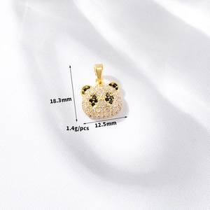 Detailed size view of 14k gold bear pendant with measurements 18.3mm by 12.5mm