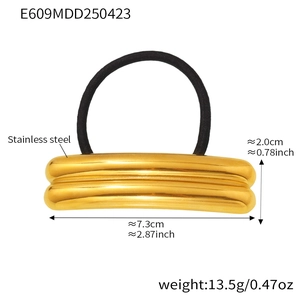 Detail view of gold stainless steel hair tie showing dimensions 2.0cm by 7.3cm