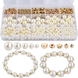 770-piece DIY jewelry making kit with cream faux pearls and gold spacers in a 15-grid box