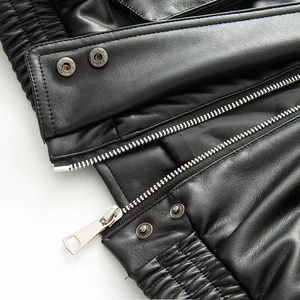 Women black faux leather jacket featuring silver zippers and premium textured stitching