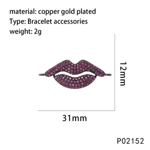 Detail view of lip pendant with dimensions 31mm x 12mm and rose red zircon inlay