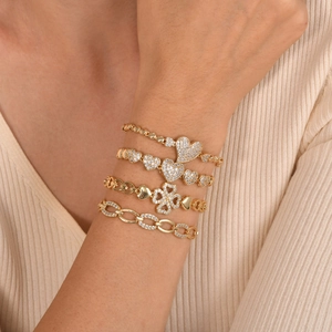 Set of four gold-plated heart and clover bracelets with sparkling zircon for women