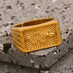 Detailed view of 18K gold-plated ring with rectangular snake relief on vintage band