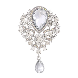 Vintage silver crystal waterdrop brooch with teardrop pendant and baroque hollow design