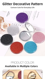 Detail view of portable folding mirrors with colorful glitter finishes in round and heart shapes