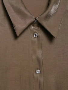 Close-up of brown twill shirt collar featuring three purple iridescent pearl buttons