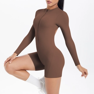 Detail of coffee brown backless yoga romper with half-zip collar and slim-fit texture