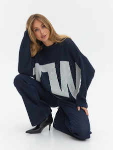 Navy blue knitted two-piece set featuring oversized sweater with letter jacquard and trousers