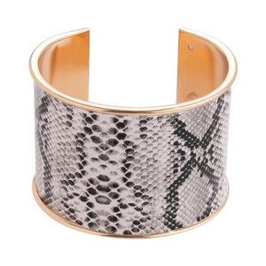 Vintage gold cuff bracelet with black and white snakeskin pattern for modern women